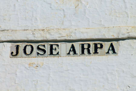 Carmona Spain July 15, 2021 Artistic street sign, erected at the side of or above roads to provide information to road user in the typical narrow and meandering town of Carmona called The Bright Star of Europeのeditorial素材