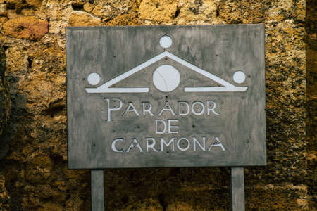 Carmona Spain July 15, 2021 Road sign, erected at the side of or above roads to provide information to road user in the typical narrow and meandering town of Carmona called The Bright Star of Europeのeditorial素材