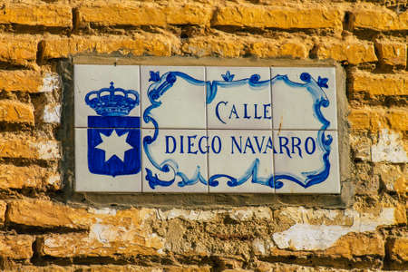 Carmona Spain July 15, 2021 Artistic street sign, erected at the side of or above roads to provide information to road user in the typical narrow and meandering town of Carmona called The Bright Star of Europeのeditorial素材