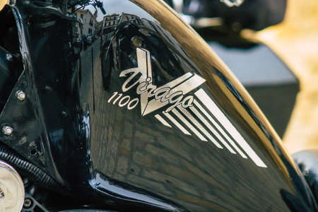 Seville Spain July 12, 2021 Closeup of the mechanics of a motorcycle parked in a parking lot located in the city center of Seville, an emblematic city and the capital of the region of Andalusia, in the south of Spainのeditorial素材