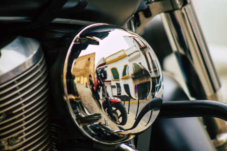 Seville Spain July 12, 2021 Closeup of the mechanics of a motorcycle parked in a parking lot located in the city center of Seville, an emblematic city and the capital of the region of Andalusia, in the south of Spainのeditorial素材
