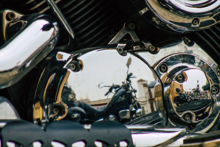 Seville Spain July 12, 2021 Closeup of the mechanics of a motorcycle parked in a parking lot located in the city center of Seville, an emblematic city and the capital of the region of Andalusia, in the south of Spainのeditorial素材