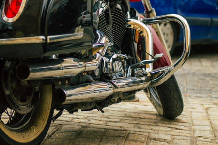 Seville Spain July 12, 2021 Closeup of the mechanics of a motorcycle parked in a parking lot located...