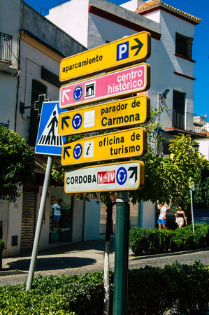 Carmona Spain July 18, 2021 Street sign or road sign, erected at the side of or above roads to provide information to road user in the downtown area of Carmonaの写真素材