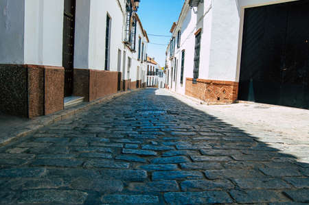 Carmona Spain July 18, 2021 Narrow street in town of Carmona called The Bright Star of Europe, the town shows a typical narrow and meandering Arabic layoutの写真素材