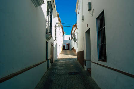 Carmona Spain July 18, 2021 Narrow street in town of Carmona called The Bright Star of Europe, the town shows a typical narrow and meandering Arabic layoutの写真素材