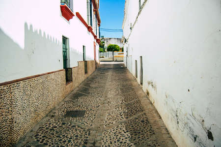 Carmona Spain July 18, 2021 Narrow street in town of Carmona called The Bright Star of Europe, the town shows a typical narrow and meandering Arabic layoutの写真素材