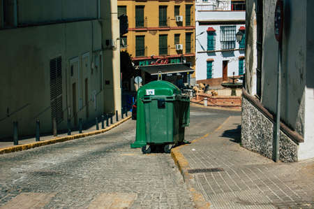 Carmona Spain July 18, 2021 Garbage container in the streets of Carmona called The Bright Star of Europe, the town shows a typical narrow and meandering Arabic layoutの写真素材