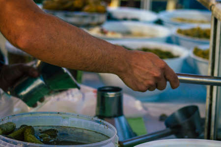 Carmona Spain July 19, 2021 Various olives sold at the local market in downtown during Coronavirus outbreak hitting Spain, wearing a mask is mandatoryのeditorial素材