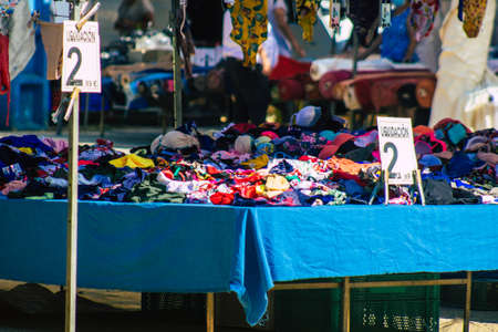 Carmona Spain July 19, 2021 Various summer clothes sold at the local market in downtown during Coronavirus outbreak hitting Spain, wearing a mask is mandatoryのeditorial素材