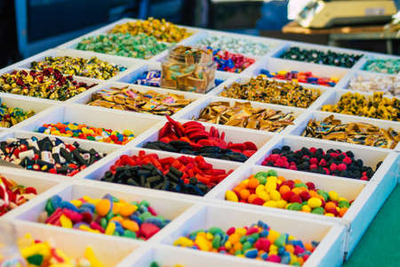 Carmona Spain July 19, 2021 Various sweet candies sold at the local market in downtown during Coronavirus outbreak hitting Spain, wearing a mask is mandatoryのeditorial素材