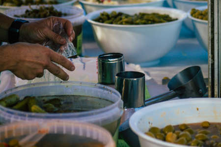 Carmona Spain July 19, 2021 Various olives sold at the local market in downtown during Coronavirus outbreak hitting Spain, wearing a mask is mandatoryのeditorial素材