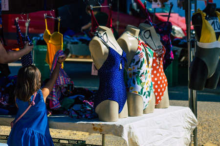 Carmona Spain July 19, 2021 Various summer clothes sold at the local market in downtown during Coronavirus outbreak hitting Spain, wearing a mask is mandatoryのeditorial素材