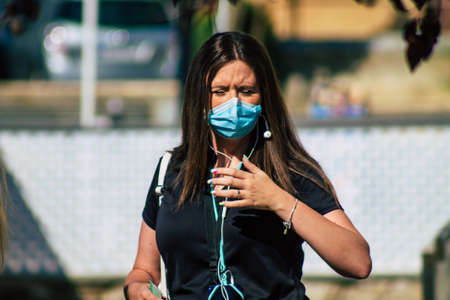 Carmona Spain July 18, 2021 Pedestrian walking in the streets of Carmona during the coronavirus...