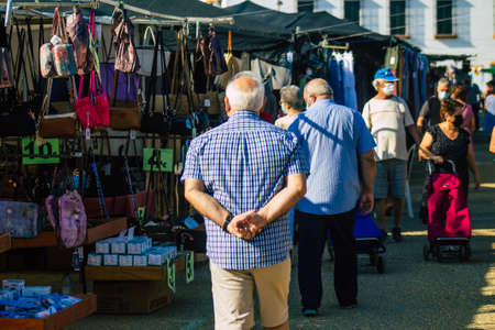Carmona Spain July 19, 2021 Unidentified Spanish people with face mask shopping at local market in downtown during Coronavirus outbreak hitting Spain, wearing a mask is mandatoryのeditorial素材