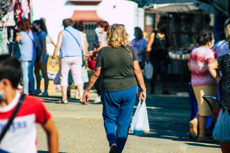 Carmona Spain July 19, 2021 Unidentified Spanish people with face mask shopping at local market in downtown during Coronavirus outbreak hitting Spain, wearing a mask is mandatoryのeditorial素材