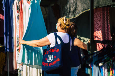 Carmona Spain July 19, 2021 Unidentified Spanish people with face mask shopping at local market in downtown during Coronavirus outbreak hitting Spain, wearing a mask is mandatoryのeditorial素材