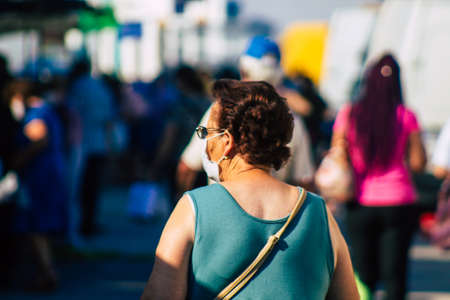 Carmona Spain July 19, 2021 Unidentified Spanish people with face mask shopping at local market in downtown during Coronavirus outbreak hitting Spain, wearing a mask is mandatoryのeditorial素材
