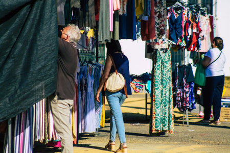 Carmona Spain July 19, 2021 Unidentified Spanish people with face mask shopping at local market in downtown during Coronavirus outbreak hitting Spain, wearing a mask is mandatoryのeditorial素材