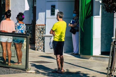 Carmona Spain July 18, 2021 Pedestrian walking in the streets of Carmona during the coronavirus...