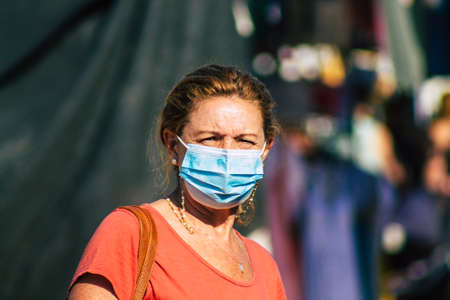 Carmona Spain July 19, 2021 Unidentified Spanish people with face mask shopping at local market in downtown during Coronavirus outbreak hitting Spain, wearing a mask is mandatoryのeditorial素材