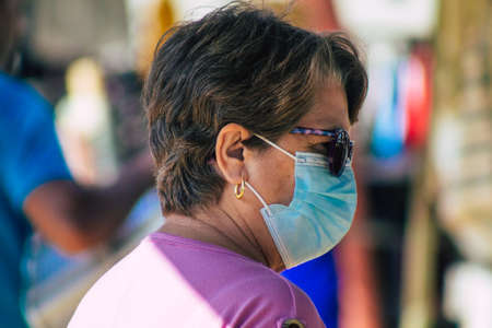 Carmona Spain July 19, 2021 Unidentified Spanish people with face mask shopping at local market in downtown during Coronavirus outbreak hitting Spain, wearing a mask is mandatoryのeditorial素材