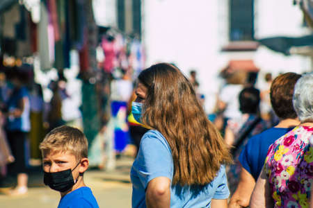 Carmona Spain July 19, 2021 Unidentified Spanish people with face mask shopping at local market in downtown during Coronavirus outbreak hitting Spain, wearing a mask is mandatoryのeditorial素材