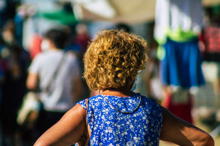 Carmona Spain July 19, 2021 Unidentified Spanish people with face mask shopping at local market in downtown during Coronavirus outbreak hitting Spain, wearing a mask is mandatoryのeditorial素材