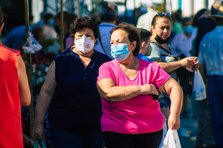 Carmona Spain July 19, 2021 Unidentified Spanish people with face mask shopping at local market in downtown during Coronavirus outbreak hitting Spain, wearing a mask is mandatoryのeditorial素材