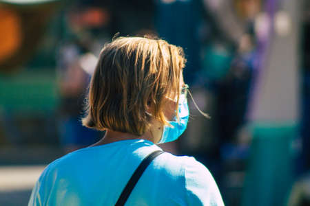 Carmona Spain July 19, 2021 Unidentified Spanish people with face mask shopping at local market in downtown during Coronavirus outbreak hitting Spain, wearing a mask is mandatoryのeditorial素材