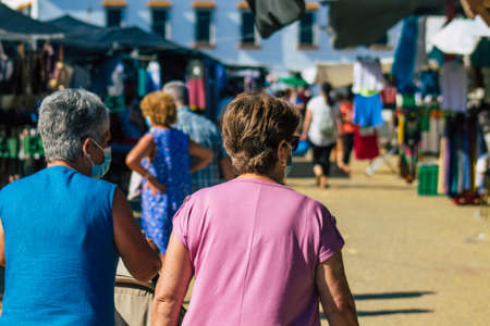 Carmona Spain July 19, 2021 Unidentified Spanish people with face mask shopping at local market in downtown during Coronavirus outbreak hitting Spain, wearing a mask is mandatoryのeditorial素材