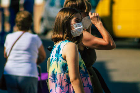 Carmona Spain July 19, 2021 Unidentified Spanish people with face mask shopping at local market in downtown during Coronavirus outbreak hitting Spain, wearing a mask is mandatoryのeditorial素材