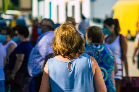 Carmona Spain July 19, 2021 Unidentified Spanish people with face mask shopping at local market in downtown during Coronavirus outbreak hitting Spain, wearing a mask is mandatoryのeditorial素材