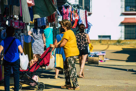 Carmona Spain July 19, 2021 Unidentified Spanish people with face mask shopping at local market in downtown during Coronavirus outbreak hitting Spain, wearing a mask is mandatoryのeditorial素材