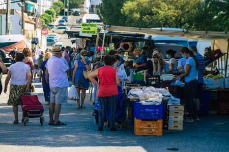 Carmona Spain July 19, 2021 Unidentified Spanish people with face mask shopping at local market in downtown during Coronavirus outbreak hitting Spain, wearing a mask is mandatoryのeditorial素材