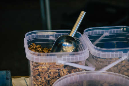 Carmona Spain July 19, 2021 Various dry fruits sold at the local market in downtown during Coronavirus outbreak hitting Spain, wearing a mask is mandatoryのeditorial素材