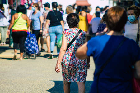 Carmona Spain July 19, 2021 Unidentified Spanish people with face mask shopping at local market in downtown during Coronavirus outbreak hitting Spain, wearing a mask is mandatoryのeditorial素材