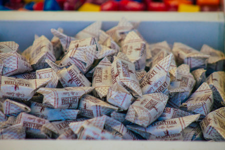 Carmona Spain July 19, 2021 Various sweet candies sold at the local market in downtown during Coronavirus outbreak hitting Spain, wearing a mask is mandatoryのeditorial素材