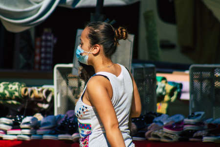 Carmona Spain July 19, 2021 Unidentified Spanish people with face mask shopping at local market in downtown during Coronavirus outbreak hitting Spain, wearing a mask is mandatoryのeditorial素材