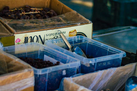 Carmona Spain July 19, 2021 Various dry fruits sold at the local market in downtown during Coronavirus outbreak hitting Spain, wearing a mask is mandatoryのeditorial素材