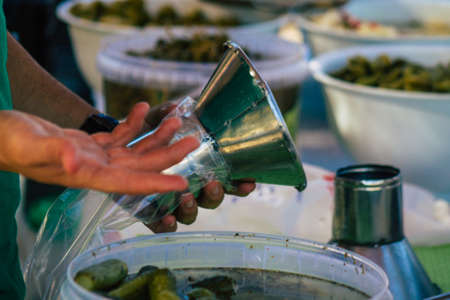 Carmona Spain July 19, 2021 Various olives sold at the local market in downtown during Coronavirus outbreak hitting Spain, wearing a mask is mandatoryのeditorial素材