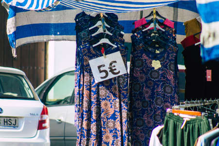 Carmona Spain July 19, 2021 Various summer clothes sold at the local market in downtown during Coronavirus outbreak hitting Spain, wearing a mask is mandatoryのeditorial素材