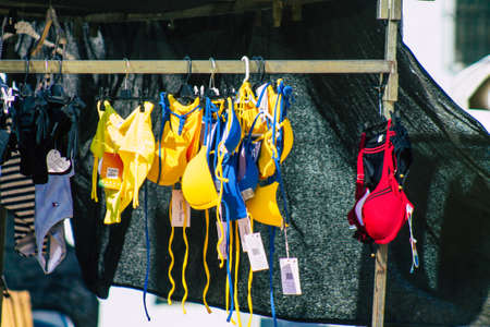 Carmona Spain July 19, 2021 Various summer clothes sold at the local market in downtown during Coronavirus outbreak hitting Spain, wearing a mask is mandatoryのeditorial素材