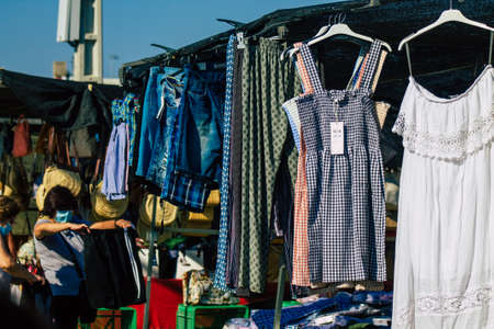 Carmona Spain July 19, 2021 Various summer clothes sold at the local market in downtown during Coronavirus outbreak hitting Spain, wearing a mask is mandatoryのeditorial素材