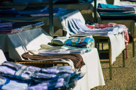 Carmona Spain July 19, 2021 Various summer clothes sold at the local market in downtown during Coronavirus outbreak hitting Spain, wearing a mask is mandatoryのeditorial素材