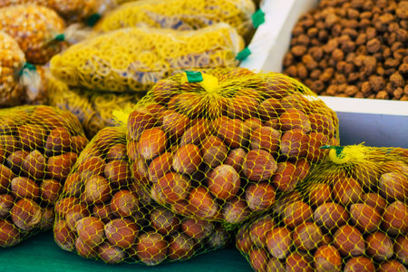 Carmona Spain July 19, 2021 Various dry fruits sold at the local market in downtown during Coronavirus outbreak hitting Spain, wearing a mask is mandatoryのeditorial素材