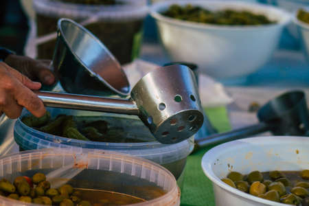 Carmona Spain July 19, 2021 Various olives sold at the local market in downtown during Coronavirus outbreak hitting Spain, wearing a mask is mandatoryのeditorial素材