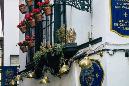 Seville Spain July 21, 2021 Facade of a building in the streets of Seville, an emblematic city and the capital of the region of Andalusia, in the south of Spainのeditorial素材