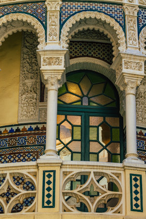 Seville Spain July 21, 2021 Facade of a building in the streets of Seville, an emblematic city and the capital of the region of Andalusia, in the south of Spainのeditorial素材