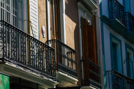 Seville Spain July 21, 2021 Facade of a building in the streets of Seville, an emblematic city and the capital of the region of Andalusia, in the south of Spainのeditorial素材